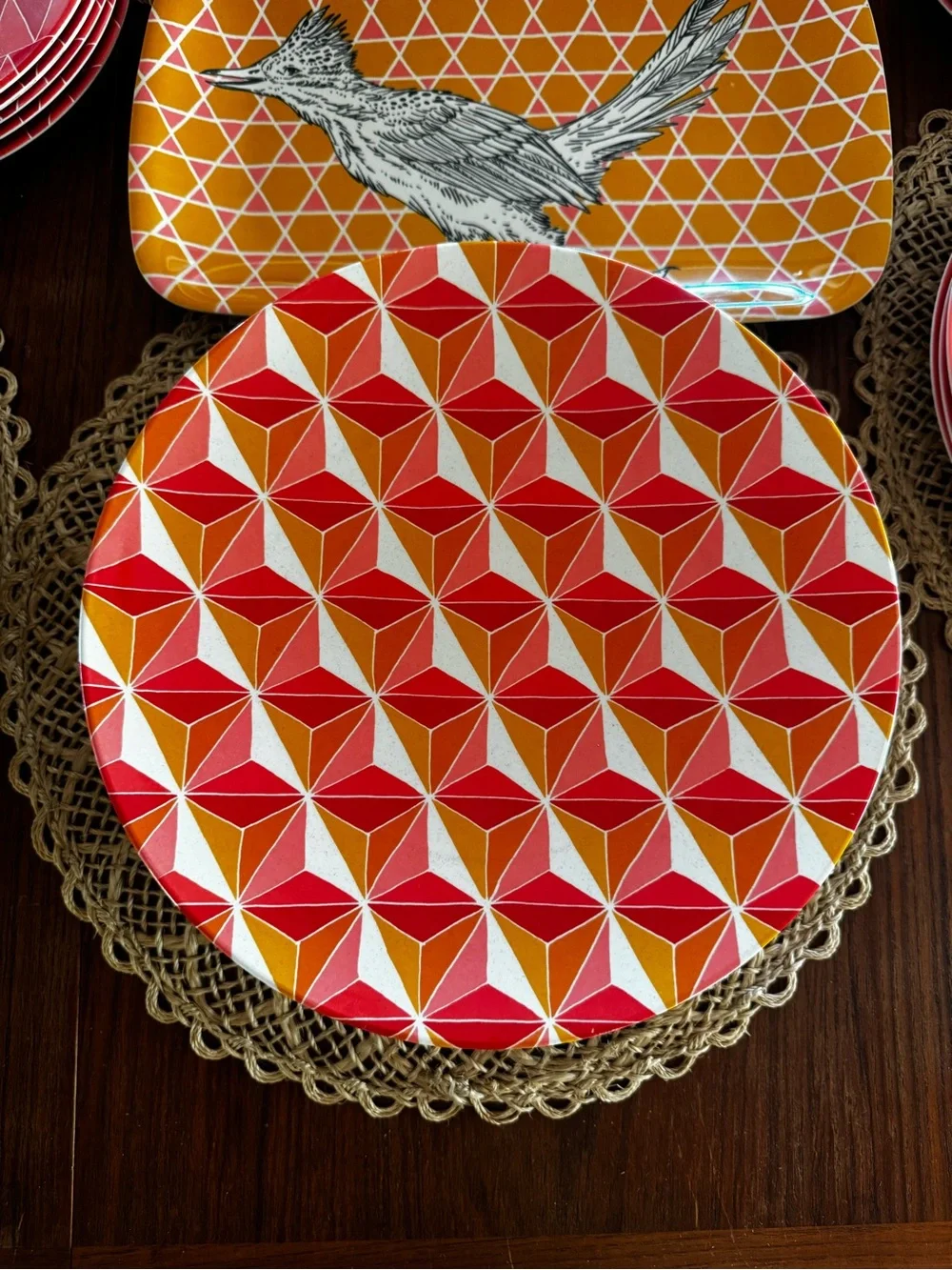 Set of 38 West Elm plates with colorful geometric prints & animal illustrations
